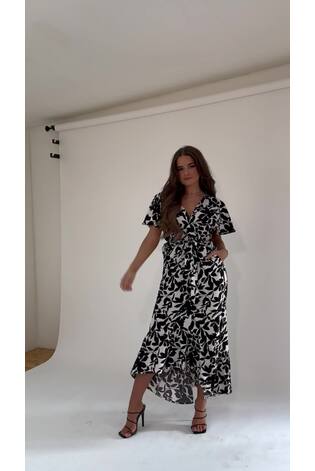 Girl In Mind Monochrome Floral Shellie Short Sleeve Tiered Belted Dress - Image 2 of 5 Girl In Mind Monochrome Floral Shellie Short Sleeve Tiered Belted Dress - Image 2 of 5