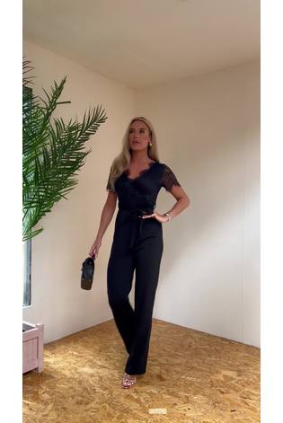 Girl In Mind Black Petite Julia Lace Wrap Wide Leg Jumpsuit - Image 1 of 1