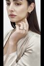 Aela Gold Tone Diamond Simulants Tier Drop Earrings - Image 2 of 5