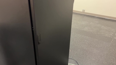 Removing the service magazine in the Diamondback tape library - IBM ...