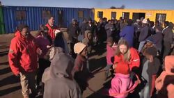 Bill and Chelsea Clinton start Africa tour by meeting children in Soweto News Clip