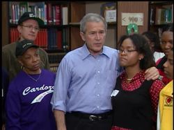 President Bush made an unannounced stop at a high school near the White House Monday to encourage people to give back to their communities to honor Martin Luther King Junior. News Clip