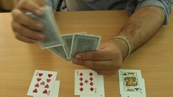 Dealing cards on table Stock Footage