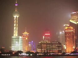 Pudong city and Huangpu River at night Stock Footage