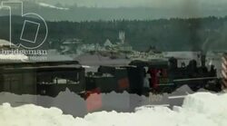 Shot of town over a train, 1908 - reenactment, clip 2 Stock Footage