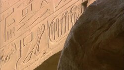 Carved hieroglyphics decorate the walls of Karnak Temple in Egypt. Stock Footage