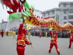 MS TS Villagers performing dragon dance in traditional festive folk celebration or carnival during chinese spring festival AUDIO / xi'an, shaanxi, china Stock Footage