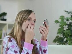 HD DOLLY: Sick Woman Moisturizing Irritated Nose Stock Footage