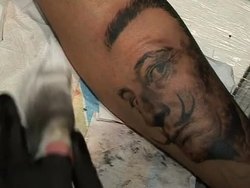VOICED: Russians go tattoo crazy News Clip