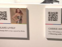 ATMOSPHERE: auction items at eBay Celebrity And Brad Pitt's Make It Right Celebrate Pop-Up Gallery Exhibition At New York's Chelsea Market on 02/09/2012 in New York Stock Footage