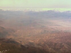 WS PAN View of cloudscape over mountain / Afghanistan. Stock Footage