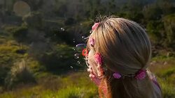 Cute woman blowing bubbles Stock Footage