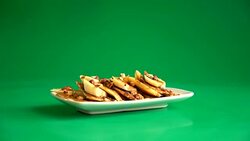 almond and bananas pancake with chocolate sauce on green screen Stock Footage