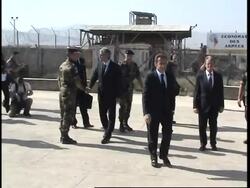 Sarkozy visits troops; wounded return home to France News Clip