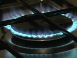 Blue flames of gas stove in the dark Stock Footage