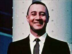 1959 close up PORTRAIT astronaut Gus Grissom in suit + tie smiling outdoors / newsreel Stock Footage