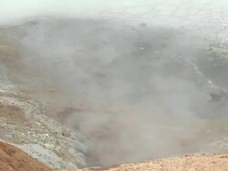 CU Steam and bubbling water coming out of earth's crust, rock formations formed from geothermal activity at leirhnjukur / Krafla, Myvatn region, Iceland Stock Footage
