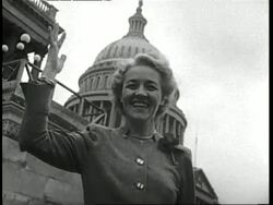 The first woman to run for the United States Presidency, Senator Margaret Chase Smith, stands and waves on the steps of the Capitol Building in Washington, D.C. News Clip