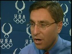 U.S. Olympic softball player Laura Berg and USOC spokesman Darryl Seibel react to the news that the relative of a coach for the men's volleyball team was killed by a knife-wielding Chinese man in Beijing News Clip