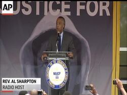 Protesters have begun marching in the Florida town where a black teenager was shot and killed by a neighborhood watch volunteer.  About a thousand people carrying signs and wearing T-shirts with the teen''s image were marching to the Sanford Police Department. News Clip