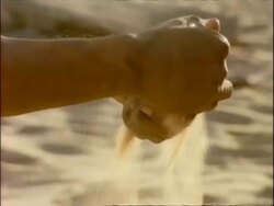 BCU hands being washed with sand, Algeria, Africa Stock Footage