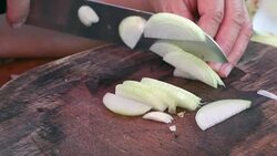 Slicing onion Stock Footage
