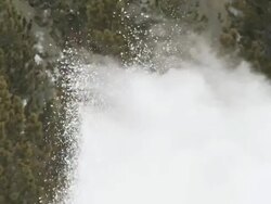 MS SLO MO Water erupting from geyser / Yellowstone National Park, Wyoming, United States Stock Footage