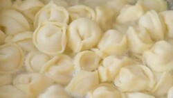 Boiling dumplings Stock Footage