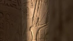 Sunlight illuminates Egyptian carvings and hieroglyphs on the walls of Karnak Temple. Stock Footage