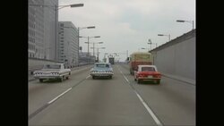 WS POV Exterior of buildings with car moving in highway / Detroit, Michigan, United States Stock Footage