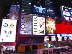 Huge digital billboards flash in Times Square. Stock Footage