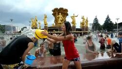 CLEAN: Flash mob water fight in Moscow fountain News Clip