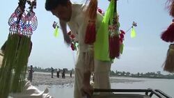 VOICED : Pakistani fishermen zap fishing with generators News Clip