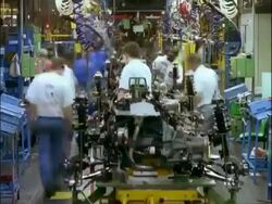 ARCHIVAL Time lapse - MS Men working on engines, Car Assembly Line, Dagenham Stock Footage