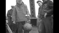 Men lower flood measuring device into Missouri River at Council Bluffs, Iowa, in 1952 News Clip