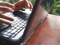 Typing on a Notebook Stock Footage