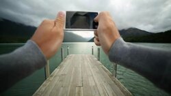 Taking pictures with a mobile phone. POV Stock Footage