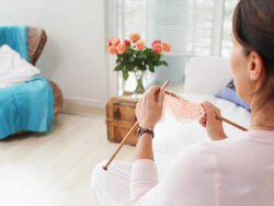 Woman at home knitting Stock Footage