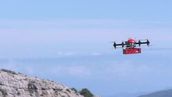 SLO MO UAV delivering a first aid box Stock Footage