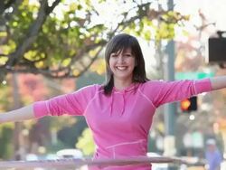 MS TD TU Young woman hula hooping on city street / Richmond, Virginia, United States Stock Footage