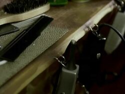 CU HA Person picking up comb from barbershop work bench, Brooklyn, New York City, New York State, USA Stock Footage