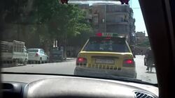 Driving shot through streets of Aleppo News Clip