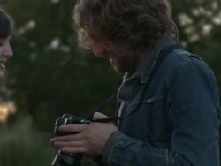 MS Couple looking at pictures on display in back of camera / Berlin, Germany   Stock Footage