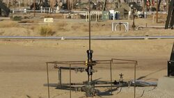 The Kern River oilfield in Oildale,  Bakersfield, California, USA. Following an unprecedented four year long drought, Bakersfield is now the driest city in the USA, driven by climate change. Still Americans fail to make the connection between their addicti Stock Footage