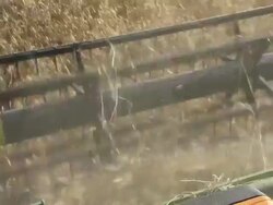CU POV Shot of Blades of harvester / Colligen Creek Deniliquen, New South Wales, Australia Stock Footage