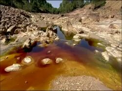 River, stained by mineral ores, Rio Tinto, Huelva, Andalusia, Spain Stock Footage