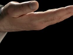 HD Super Slow-Mo: Hand Catching Falling Coins Stock Footage