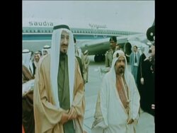 SYND 24 3 76 KING KHALID OF SAUDI ARABIA ARRIVES TO BAHRAIN AND IS GREETED AT THE AIRPORT BY KING ISA News Clip