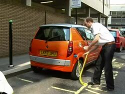 Electric cars being charged Stock Footage
