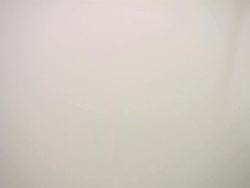 CU SLO MO Blocks of chocolate falling into milk Stock Footage